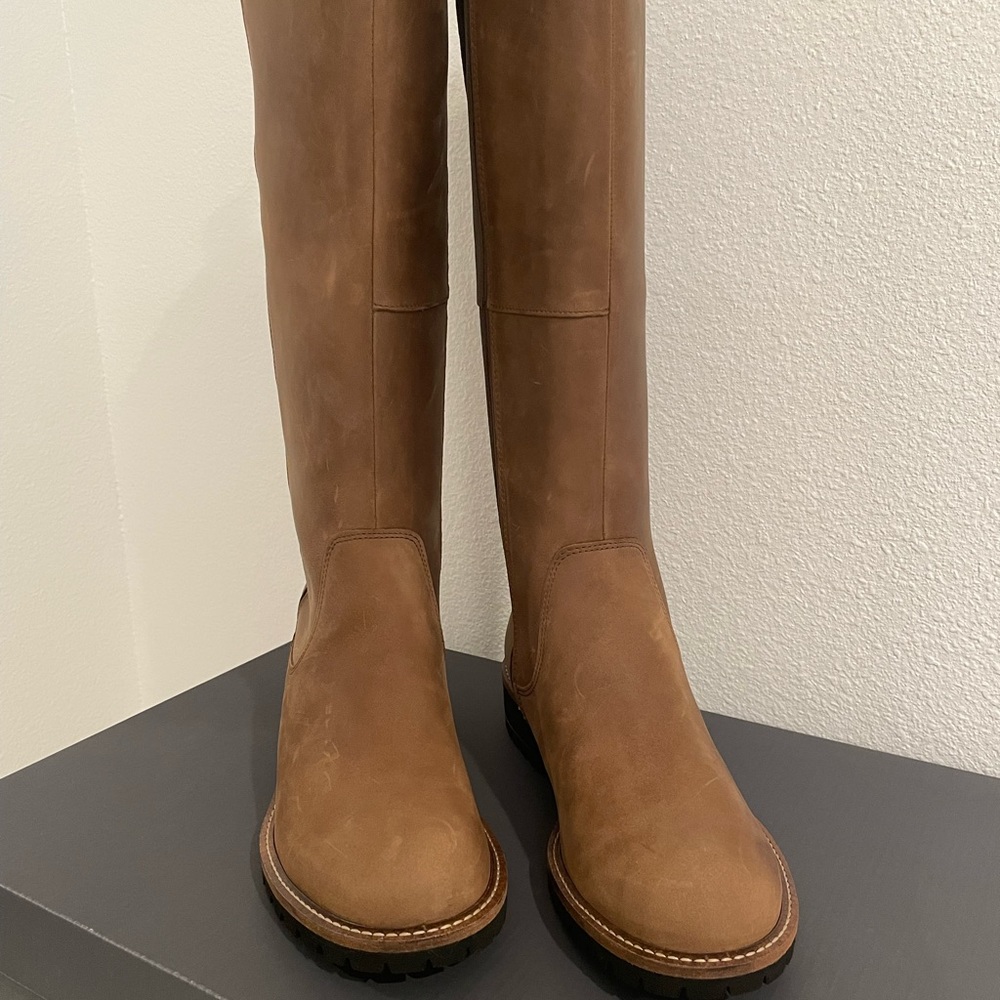 Brown tall leather boots